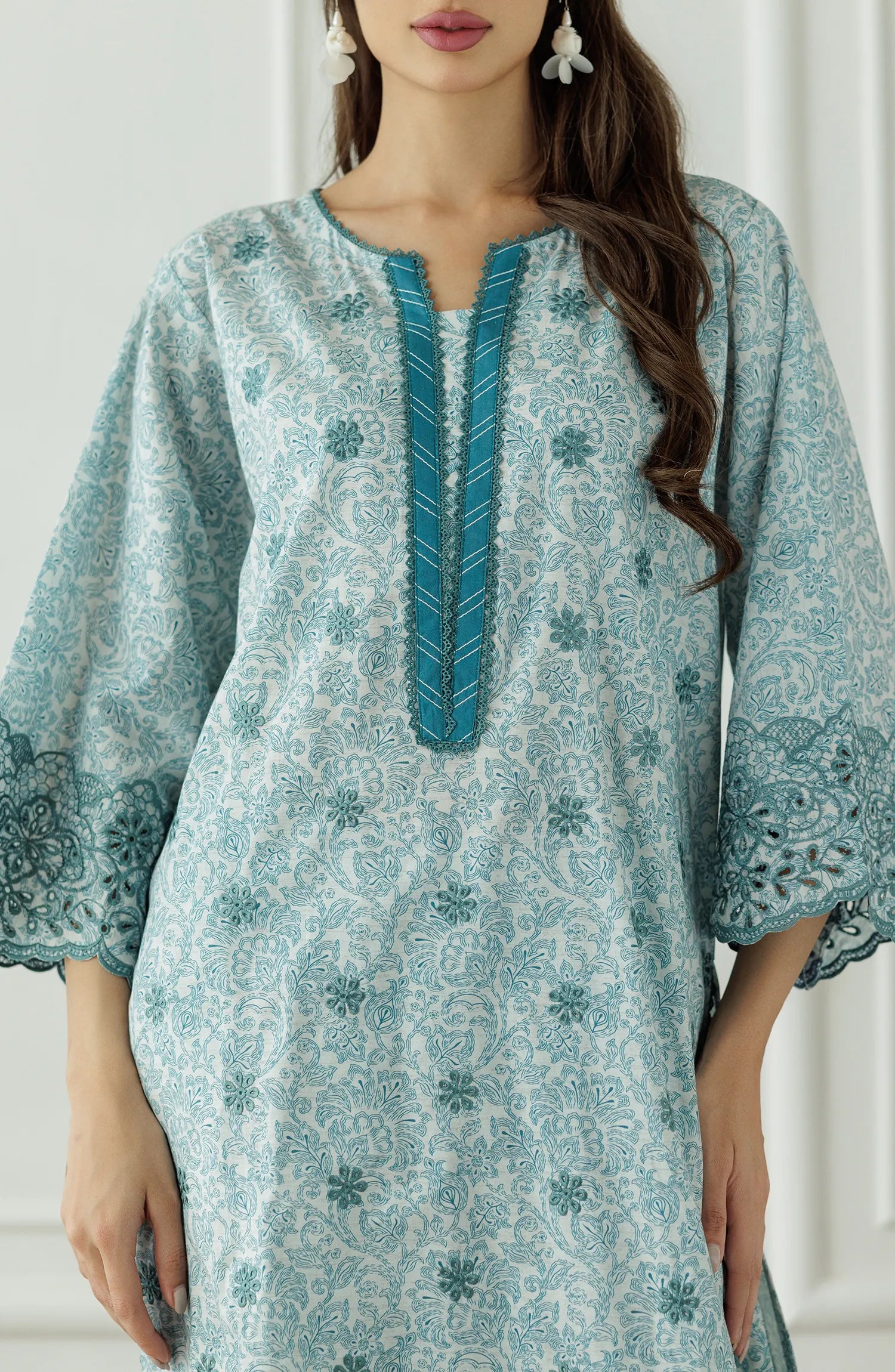 Woman wearing a light blue traditional outfit with floral patterns, Stitched Printed Lawn Shirt & Pant - 2 Piece Suits (Co-ord Set) - WRCC25S-2047